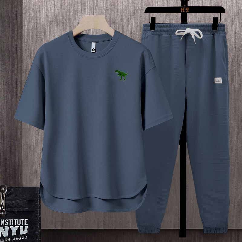 Abbigliamento da uomo Abito da uomo a maniche corte con stampa di piccoli dinosauri con scollo rotondo e orlo ampio, abito a due pezzi alla moda e versatile_voghion.com