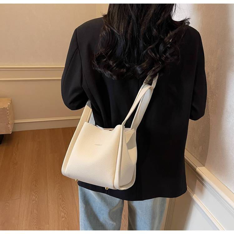 Zweiteilige, weiche Schultertasche mit Litschi-Muster für Mütter im Außenhandel. Neue, lässige, einfache, tragbare diagonale Tasche für das Leben._voghion.com