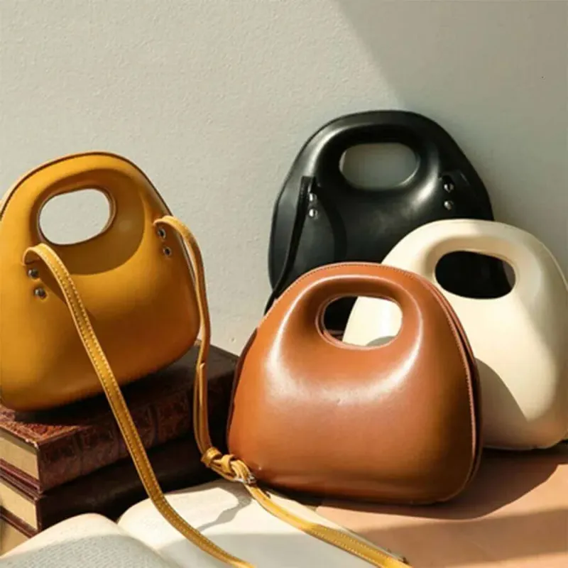 Borsa a tracolla rotonda con patta, modello conchiglia, modello retrò, da donna, modello 2025, modello a tracolla_voghion.com
