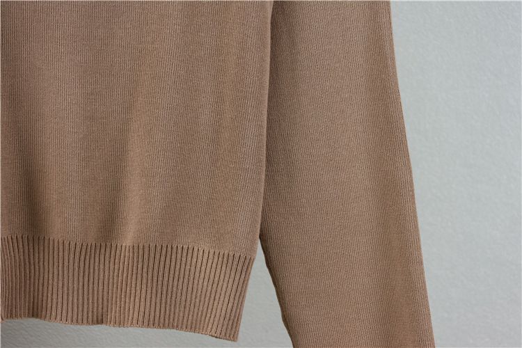 Vêtements pour femmes nouveau costume en tricot camélia haut col rond tempérament à la mode pour femmes avec jupe de hanche de couleur contrastante_voghion.com