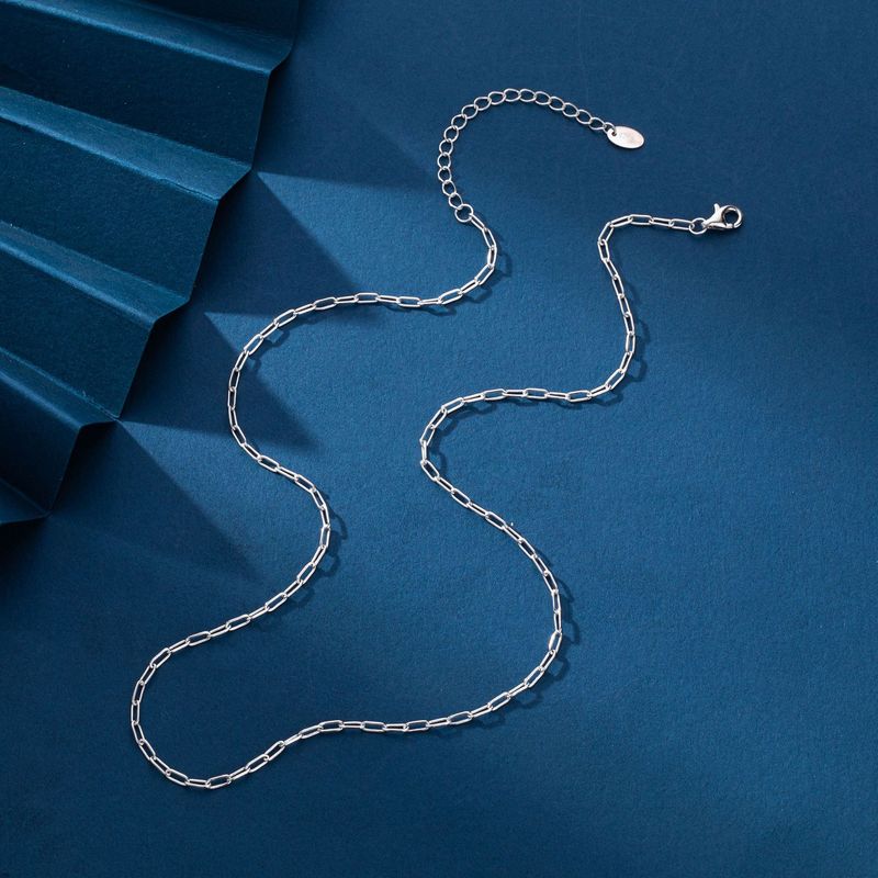 Collana da donna minimalista in argento Sterling S925 con ciondolo a croce geometrica, catena per l'eleganza quotidiana, catena per clavicola con croce a forma di fiore cubico_voghion.com