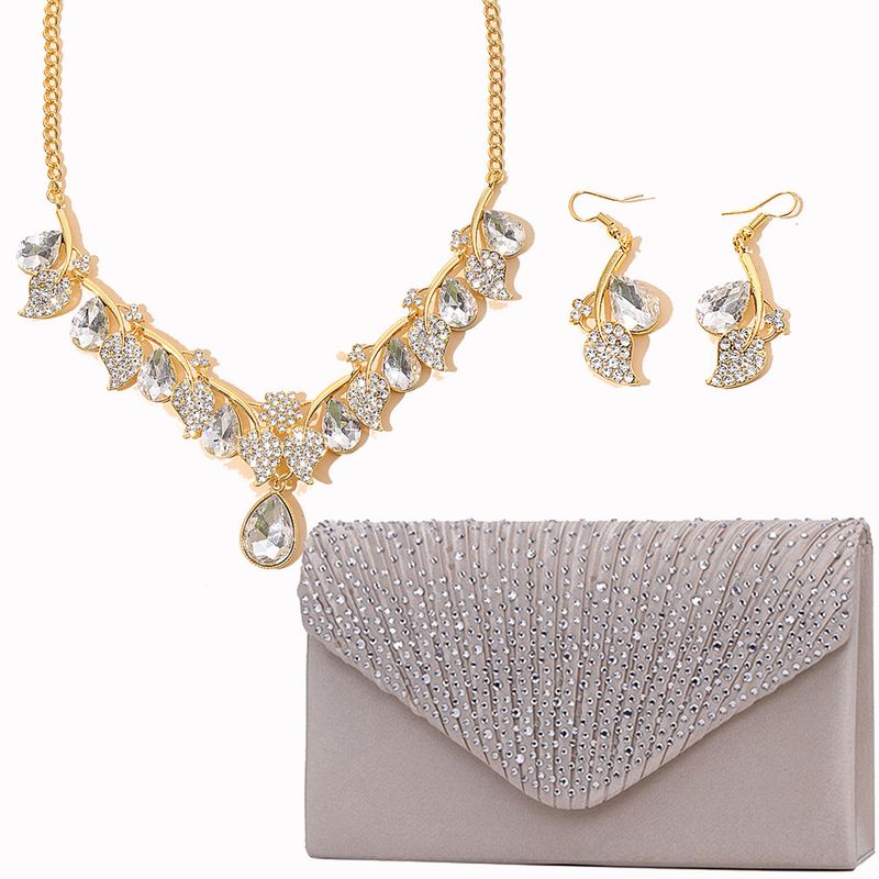 Set di gioielli da donna con collana di cristalli, pochette da sera, elegante design floreale per occasioni formali, versatile set di collana e orecchini di cristalli_voghion.com