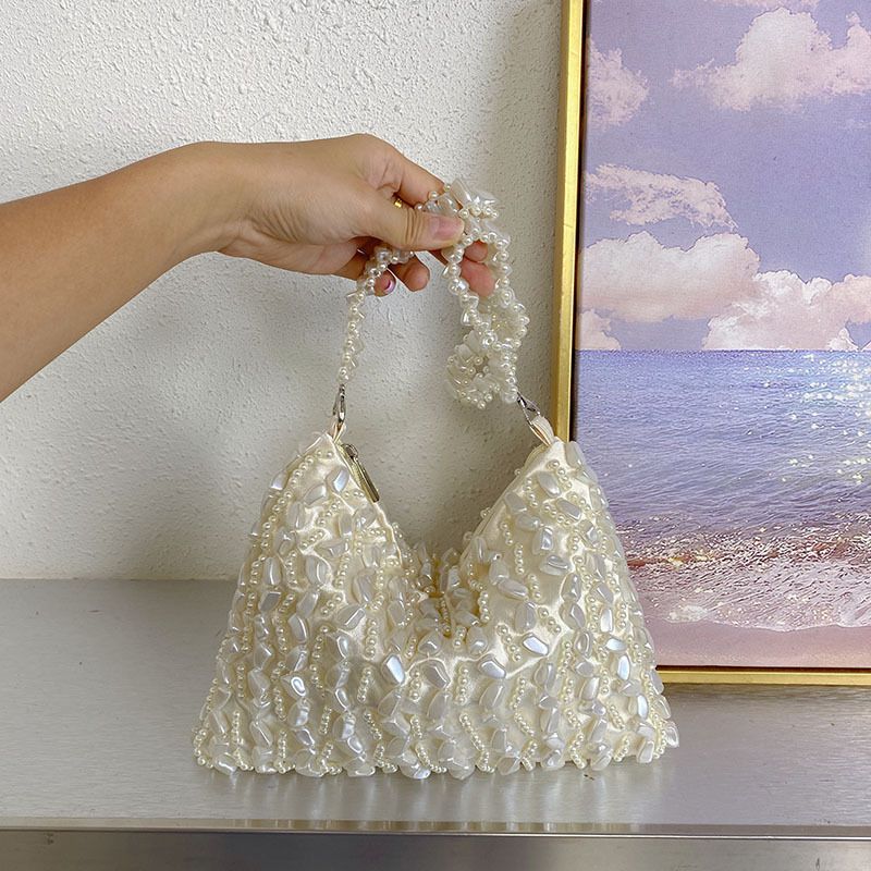 Borsa di lusso leggera con design a nicchia irregolare perlato sotto le ascelle, elegante e dal temperamento francese_voghion.com