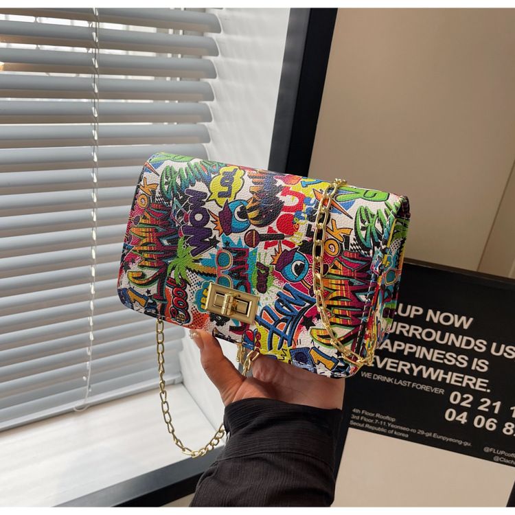 New trendy women's with Korean print style graffiti small square bag, buckle chain, single shoulder diagonal cross bag_voghion.com