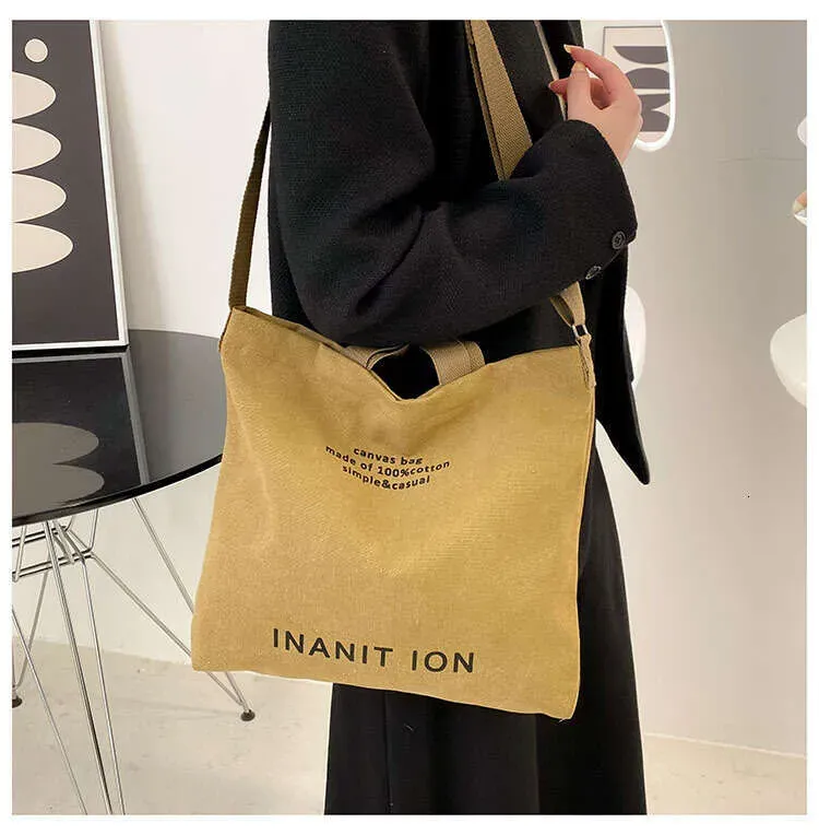 Designer Bag Unisex Japanese Washed Canvas Crossbody Backpack For Art Students - Durable & Spacious_voghion.com