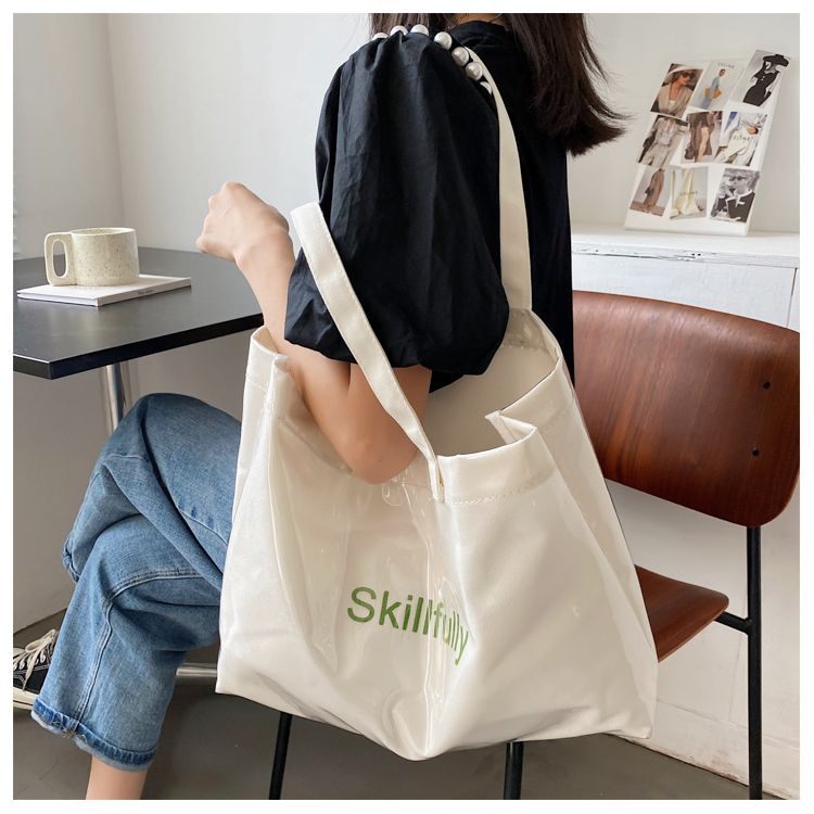 Borsa a tracolla singola alla moda, di grande capacità, da donna, versione coreana, sottobraccio, borsa tote trasparente alla moda e semplice_voghion.com