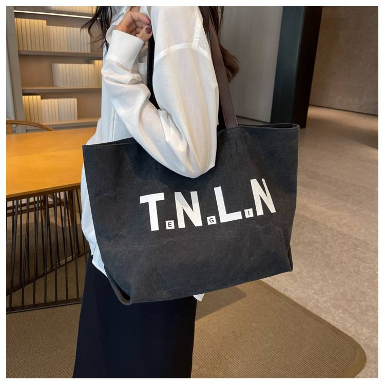 Bolsa de lona de grande capacidade feminina nova cor sólida bolsa de ombro casual versátil sacola estudante universitário classe sacos de deslocamento_voghion.com