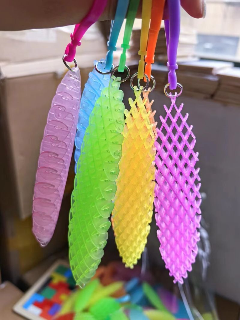 Decompression elastic net radish net children's decompression cure small toy decoration students creative deformation elastic net_voghion.com