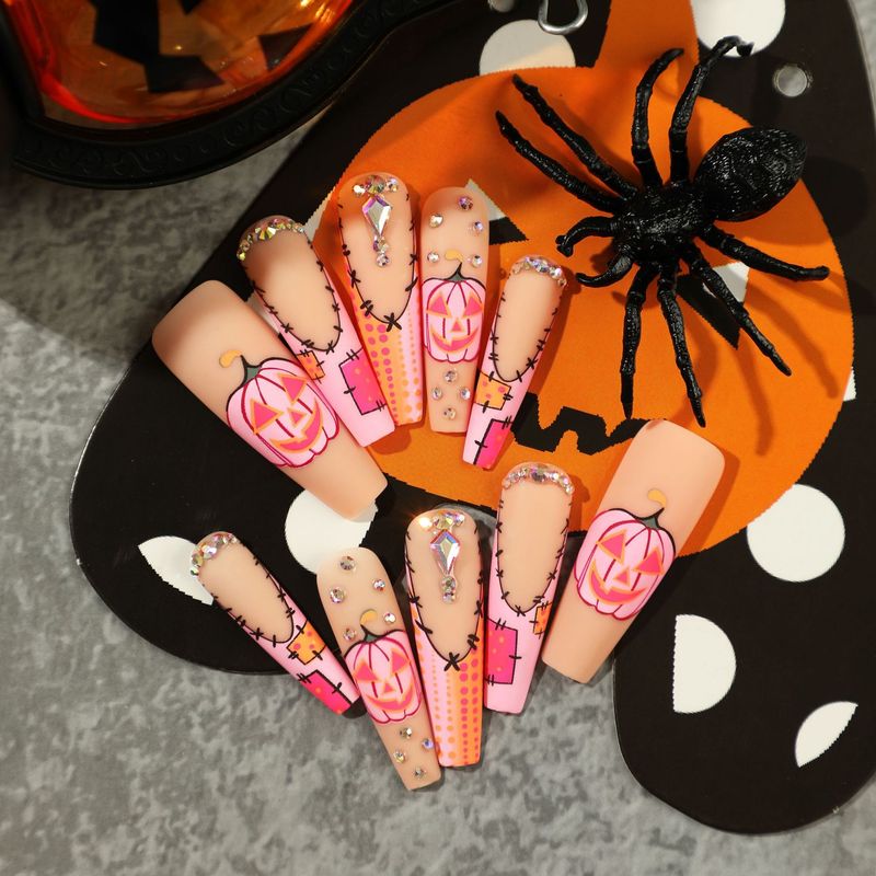 Indossa un'armatura, smalto a pois con diamanti e acqua di zucca francese rosa satinato di Halloween, smalto finito_voghion.com