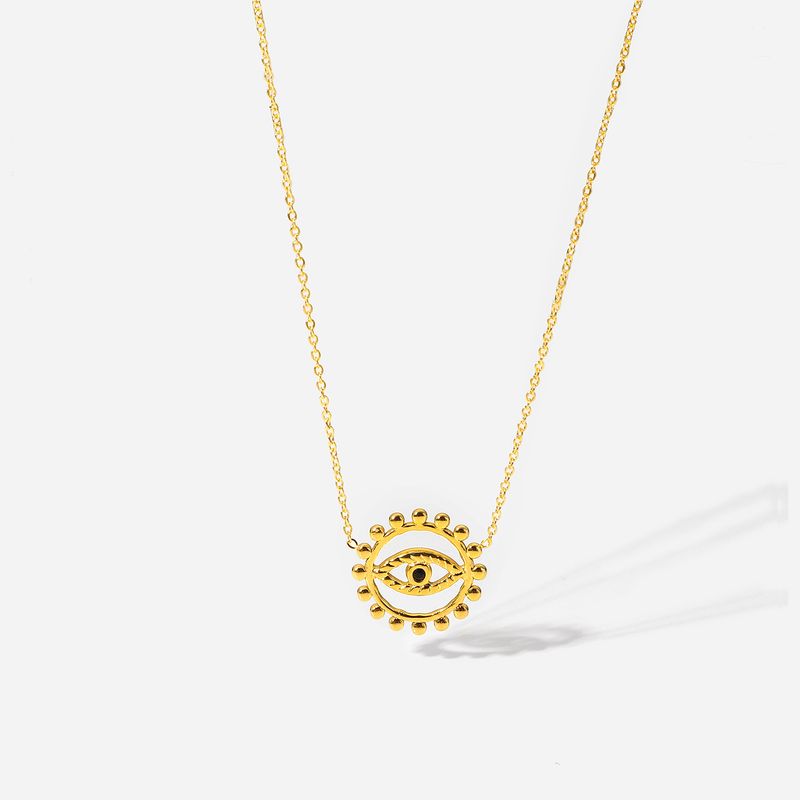 Collana in acciaio inossidabile dorato con ciondolo circolare con occhi scavati alla moda in stile INS per donna_voghion.com