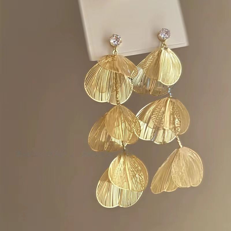 Nappa con fiore scavato con ago d'argento, alla moda, personalizzata, stile fresco e distaccato, lunga, elegante e di alta qualità._voghion.com