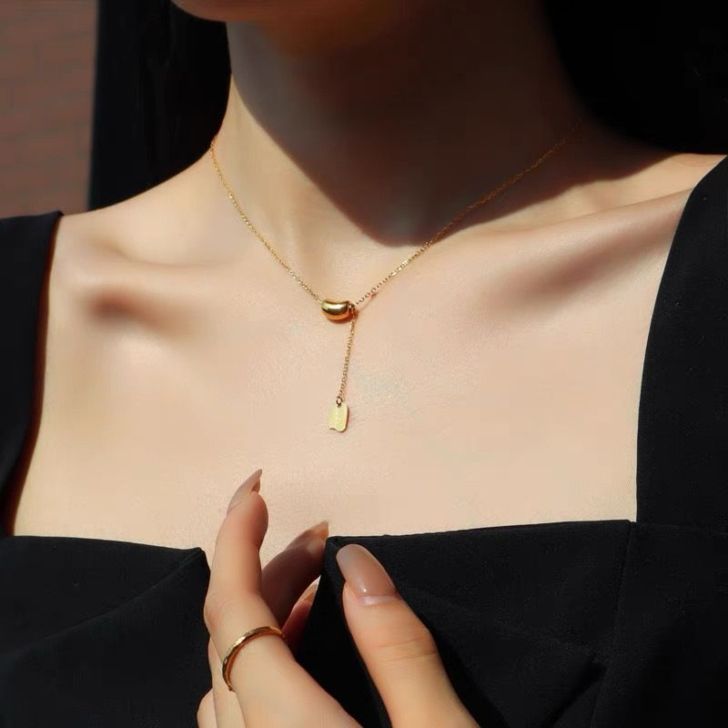 Modieuze kwast kleine gouden bonen titanium stalen ketting, eenvoudig luxe temperament, trendy en niche ontwerp meisje_voghion.com
