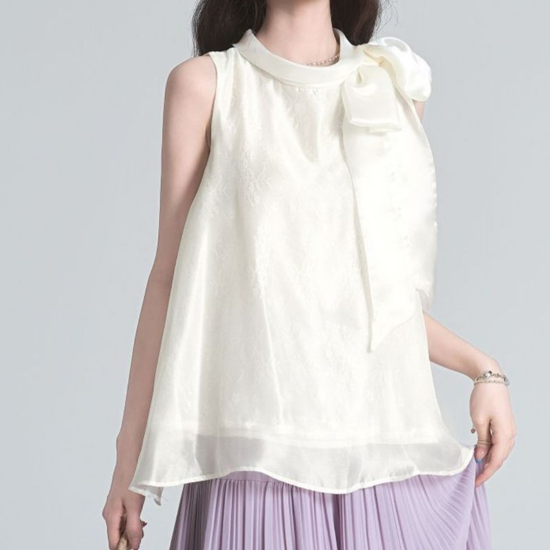 Nuova camicetta senza maniche estiva elegante e delicata da donna in stile francese color albicocca, 2025_voghion.com