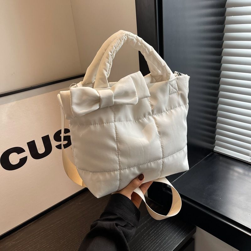 Autumn and winter women's down new cute bow single shoulder handbag space cotton temperament crossbody bag_voghion.com