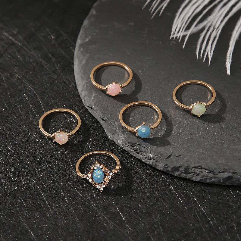 Neues modisches 5-teiliges Set mit Ringen aus Opalimitat in Bonbonfarben_voghion.com