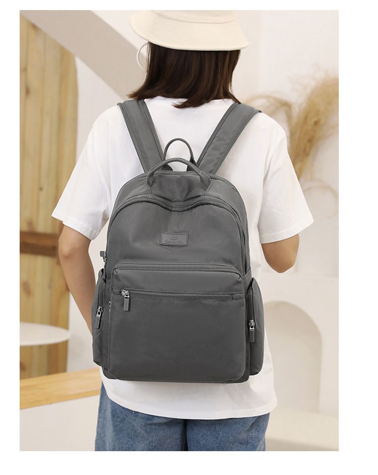 Backpack for Men and Women with Large Capacity Anti Splash Nylon Backpack for Travel Leisure and Fashion Can Be Fitted with A Suitcase Backpack_voghion.com