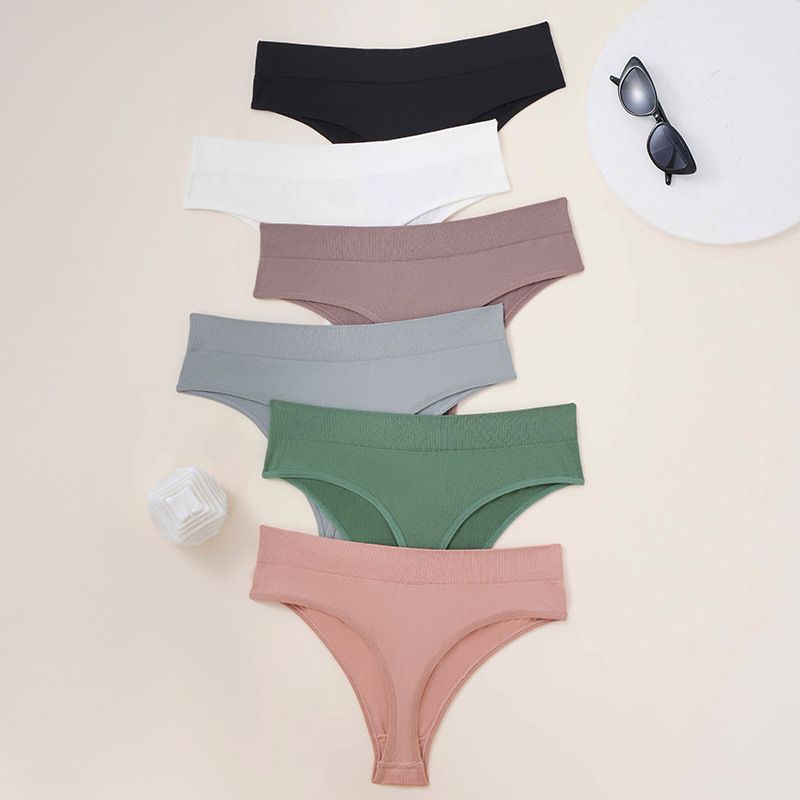 2025d Ice Silk Seamless Sexy Women's Thong Solid Color Sports Breathable Mid-Waist Pure Desire Panties For Women_voghion.com