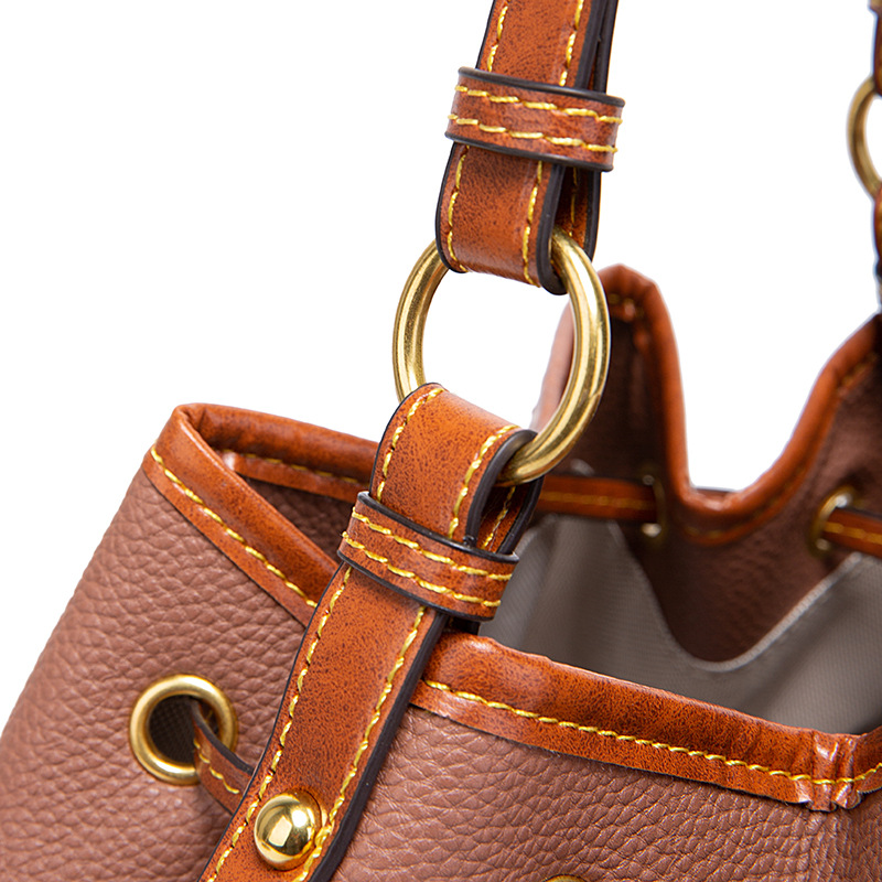 2023 New Hot Sale Retro Pebble Litchi Grain Pattern Fashion Shoulder Bag Versatile Commuting Portable Bucket Women's Bag_voghion.com