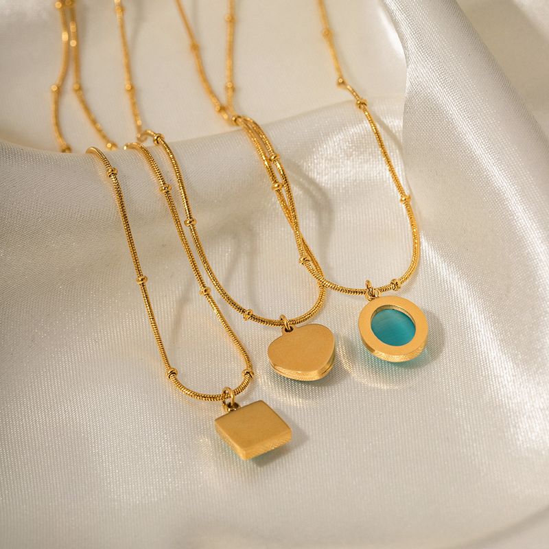 Collana da donna con ciondolo quadrato in acciaio inossidabile con occhio di gatto blu, design geometrico alla moda, pezzo minimalista da indossare tutti i giorni._voghion.com