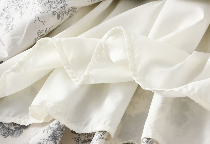 Gonna midi a vita alta con drappeggio floreale per donna; gonna a trapezio; abito lungo._voghion.com