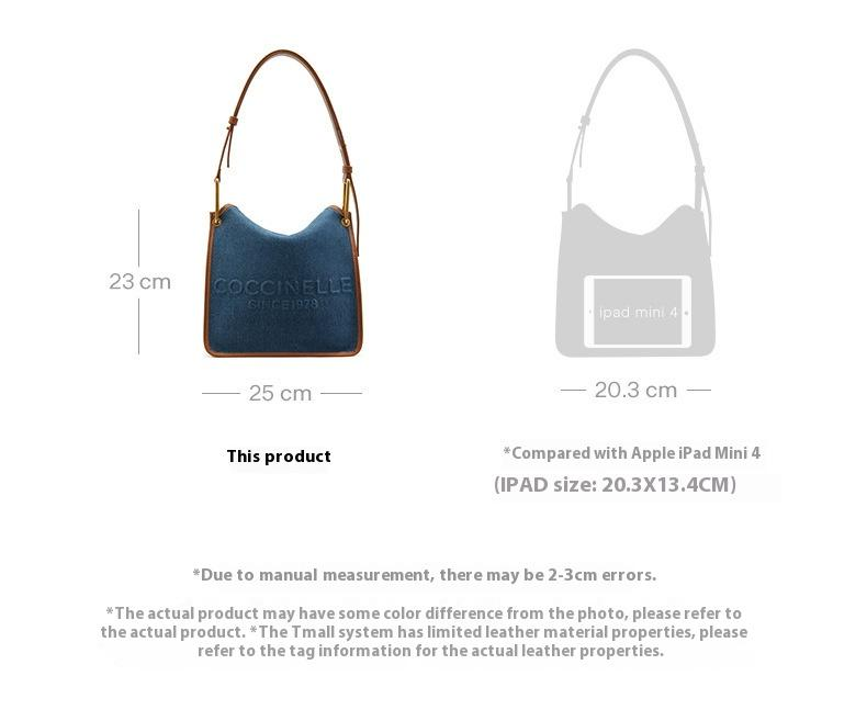 Bolsa de ombro tote jeans Vanessa Jeans da COCCINELLE, tecido azul com acabamento em couro marrom, estilosa e prática para o uso diário_voghion.com