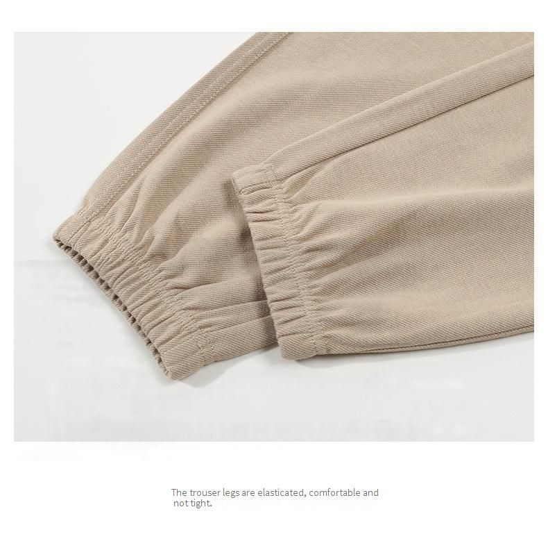 Spodnie dresowe unisex z elastycznego materiału twill z troczkami w pasie – wygodny, luźny krój dla mężczyzn i kobiet (czarny, khaki, ciemnoszary, głęboki beż)_voghion.com