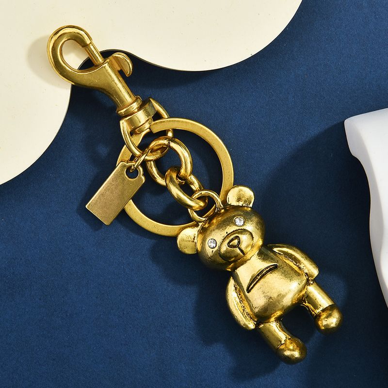 Auto Schlüsselanhänger High-End-Tasche Zubehör Bunte Bär Kirsche Klee Schmetterling Rucksack Dekorationen_voghion.com