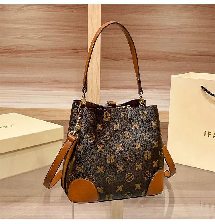 Borsa a secchiello retrò da donna: elegante borsa a tracolla e a spalla con doppio scomparto, design stampato, materiale in PVC morbido_voghion.com