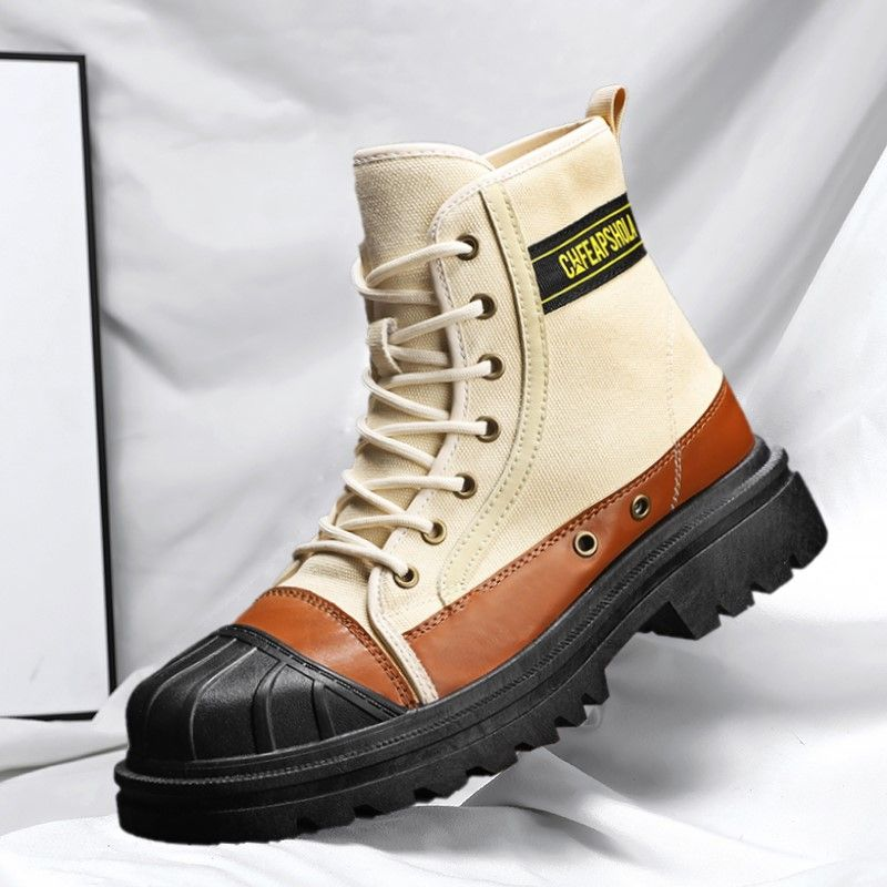 Novo equipamento de trabalho anticolisão Martin de couro, grandes botas de locomotiva, tendência versátil, deslizamento e anticongelante_voghion.com