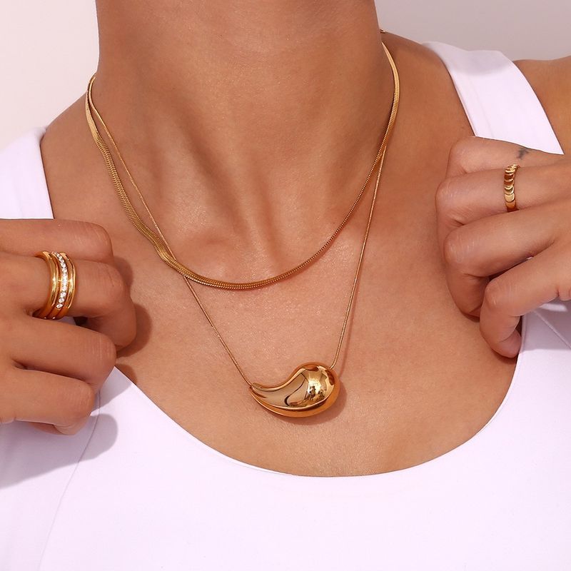 Orecchini pendenti lucidi retrò per donna, in acciaio inossidabile placcato oro, a forma di pera, tridimensionali_voghion.com