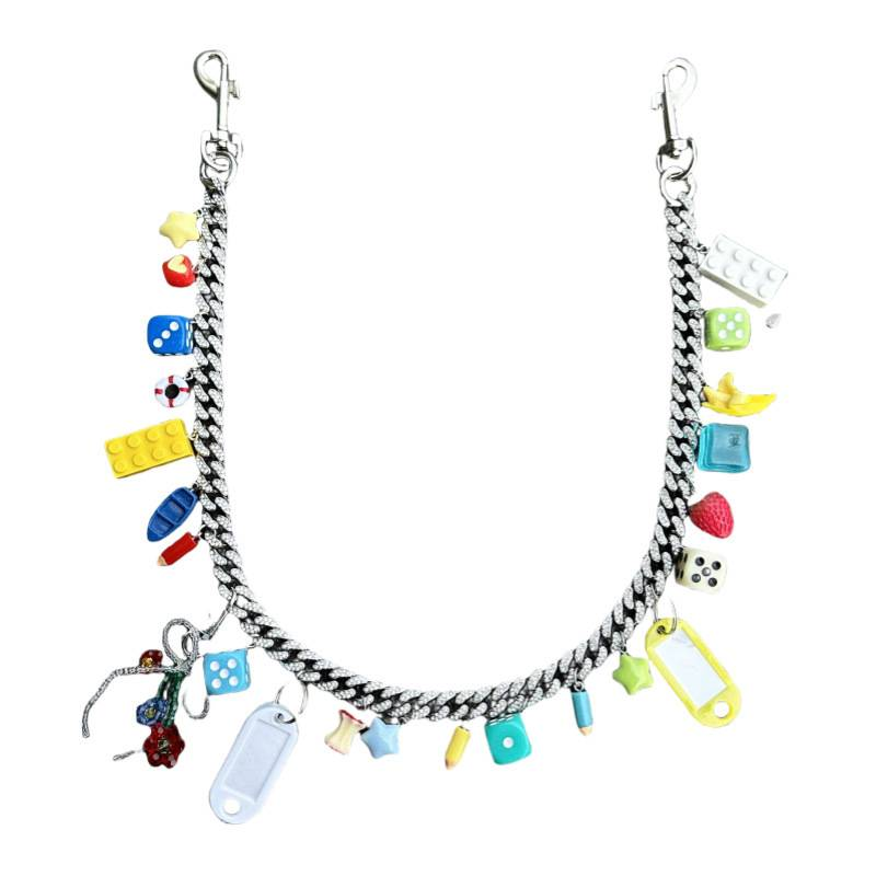 Hiphop tashangers en trendy taille-ornamenten, met diamanten bezette Cubaanse broekketting, dopamine_voghion.com