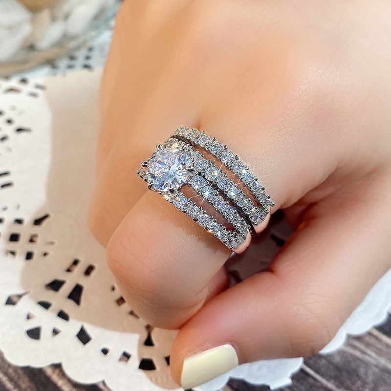 Cao Shis neues ausgehöhltes, doppelschichtiges Zirkon-Verlobungsset für Damen mit Diamant-Hochzeitsbankett, Brautring und Armband_voghion.com
