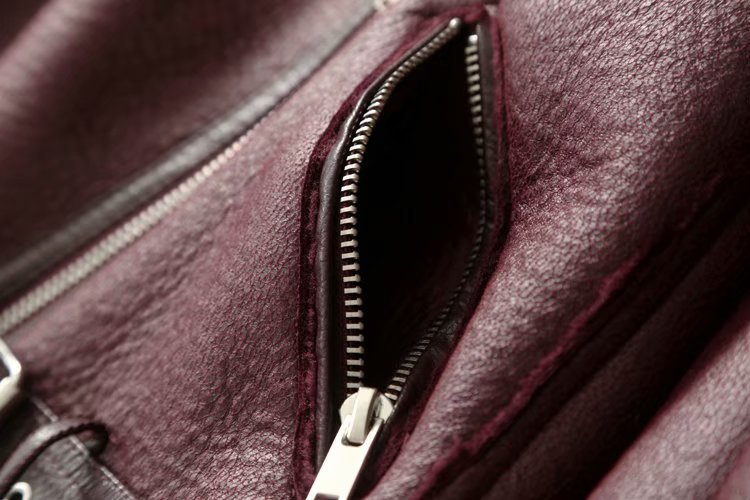Damenmode dreifarbiger langer Ledermantel mit lockerer Taille_voghion.com
