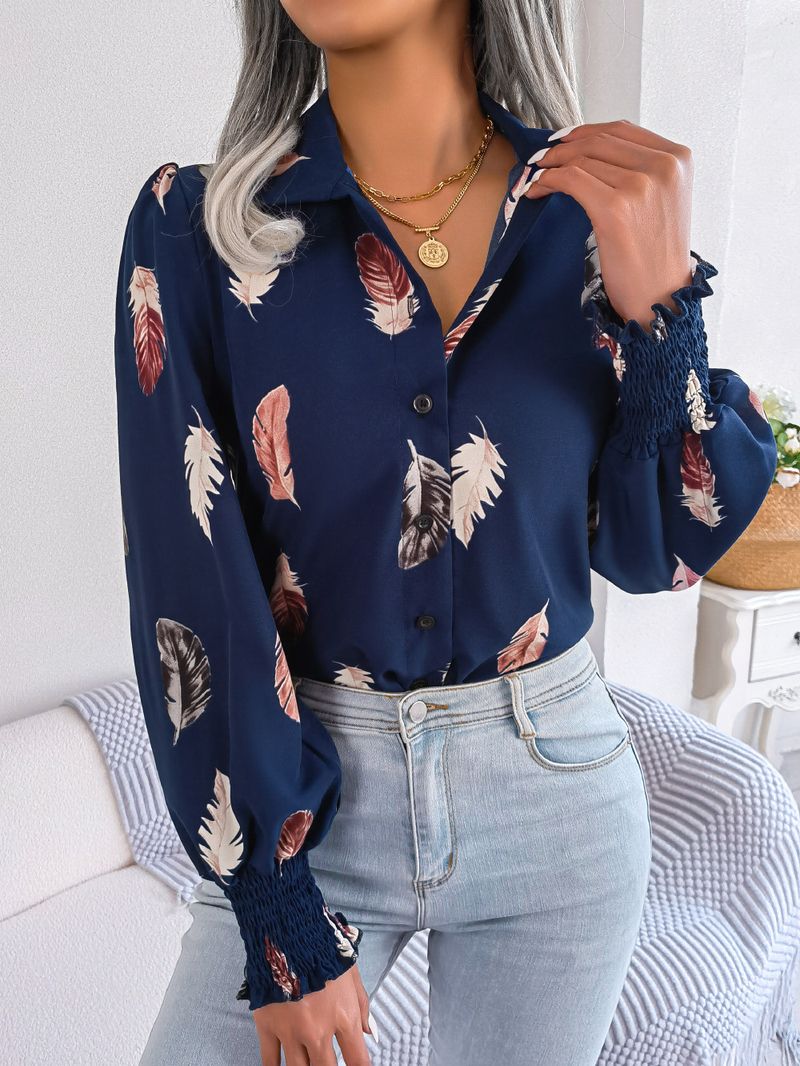 Abito da donna con camicia con risvolto e maniche a lanterna in piume di temperamento_voghion.com