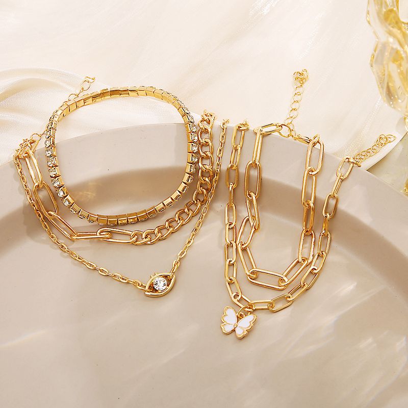 Bracciale a catena con strass a farfalla in stile punk Guoxiu, set di cinque gioielli hip-hop da donna_voghion.com