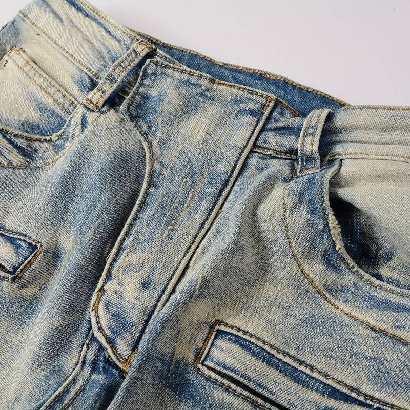 Jean bleu délavé à patchwork de mode Pantalon en denim pour hommes à poches multiples avec fermeture éclair Pantalon de motard déchiré en denim de créateur pour hommes_voghion.com