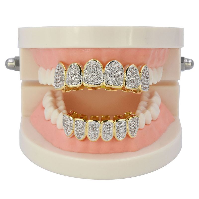 Gioielli per uomo e donna, apparecchi ortodontici con microdiamanti, denti da vampiro_voghion.com