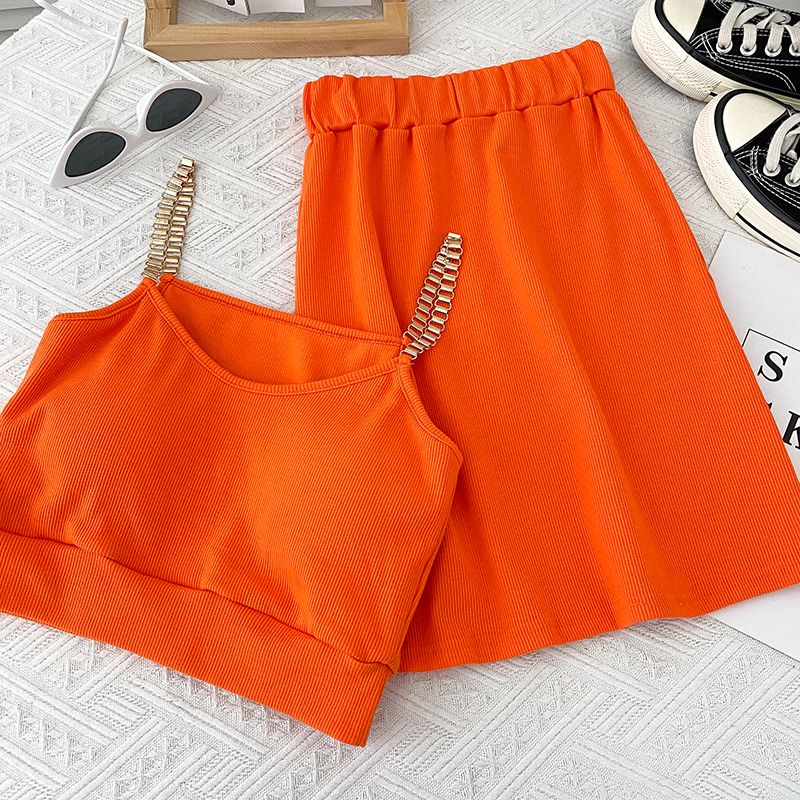 Set due pezzi con canotta corta a catena sexy da donna, gonna aderente a vita alta e gonna a vita alta_voghion.com