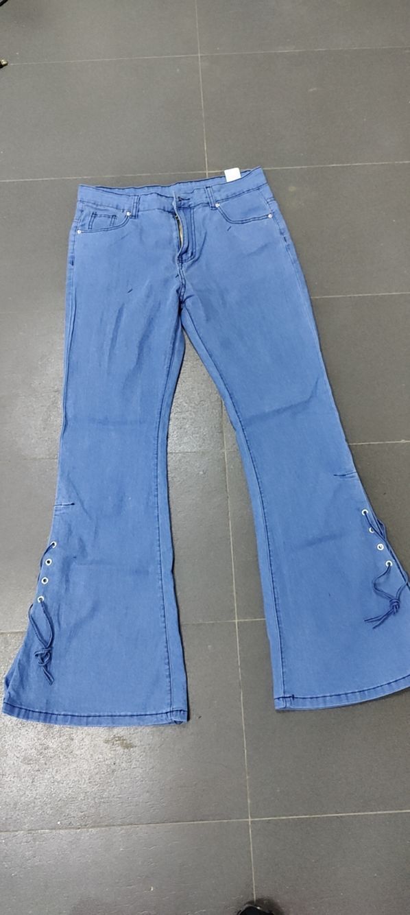 einfarbige hoch taillierte, geschnürte, dekorative Schlaghose aus Stretch-Jeans_voghion.com