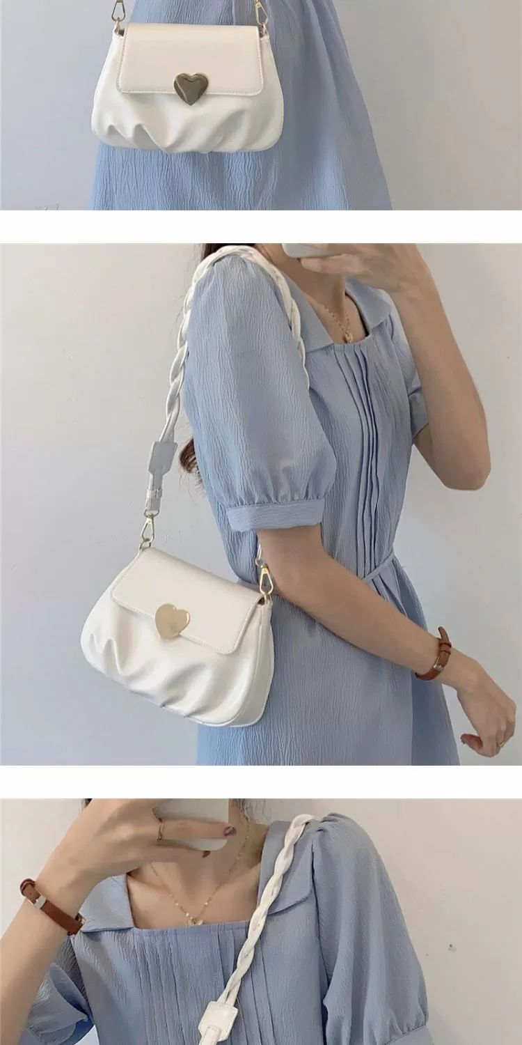 Borsa rotonda piccola pieghettata con fibbia a cuore pesca in morbida pelle da donna di design 2021 Nuova moda monospalla_voghion.com
