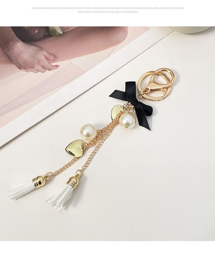 Neue exquisite Bowknot Quaste Herz Auto Schlüsselanhänger Telefon Fall Tasche Anhänger kleine Geschenk Dekoration_voghion.com