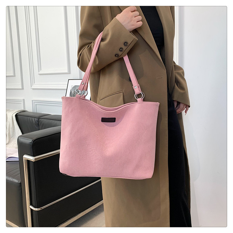 Canvas multifunctional bag women's simple and versatile commuter shoulder bag large capacity fashion tote bag_voghion.com