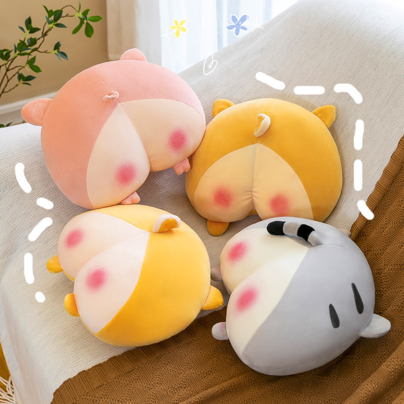 Niedliche und kreative Plüschtiere. Superweiches Kissen. Schlafendes Corgi-Gesäßkissen. Mädchenpuppenpuppe auf dem Bett_voghion.com