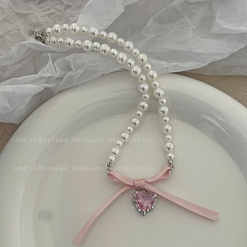 Collana con clavicola francese, dolce cuore rosa, fiocco di perle, design di nicchia femminile, dolce collana di puro desiderio_voghion.com
