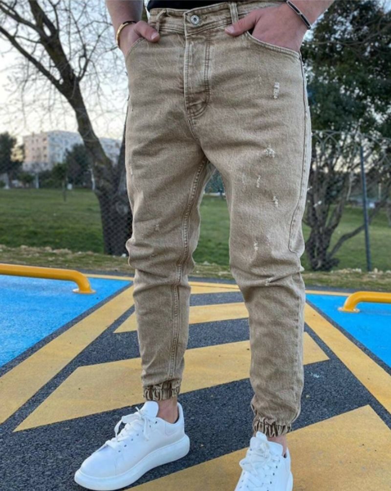 Jeans casual strappati tinta unita da uomo_voghion.com