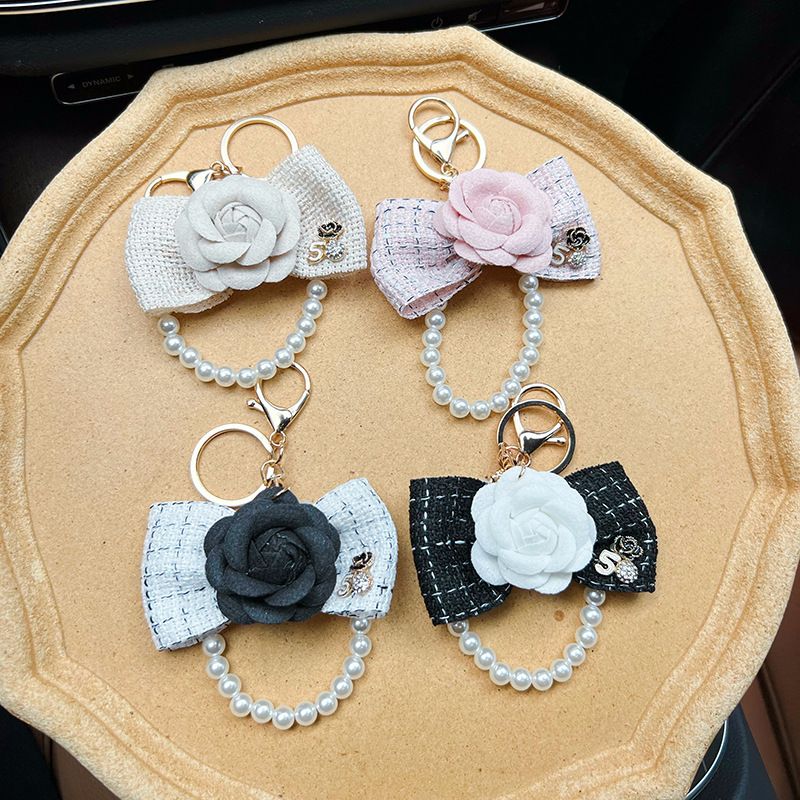 Personalized pearl chain, small fragrance bow, camellia creative and exquisite car keychain, bag decoration, female_voghion.com