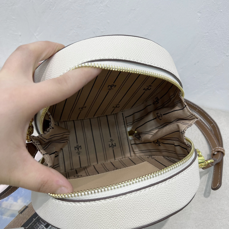 Borsa da donna, stampa vintage, borsa rotonda traforata, borsa a tracolla dal design di nicchia_voghion.com