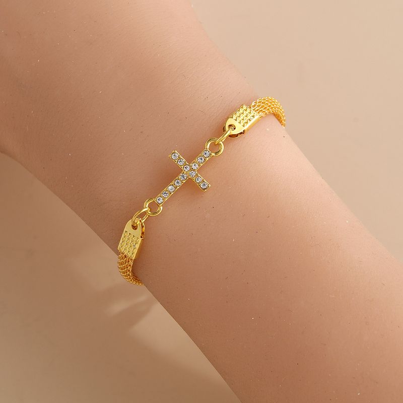 Bracciale da donna con croce di diamanti esotici da spiaggia_voghion.com