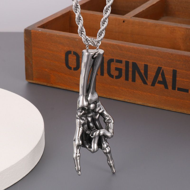 Collana con ciondolo gesto creativo alla moda in acciaio inossidabile con artiglio fantasma, stile hip hop, per uomo e donna_voghion.com