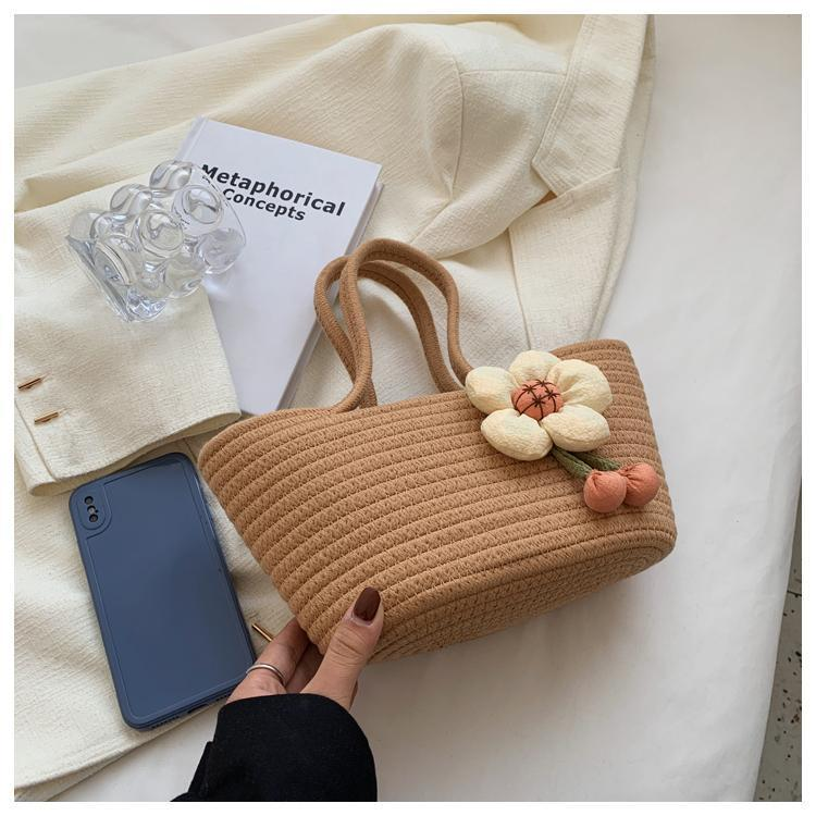 Vendita calda Tendenza moda Corda di cotone Borsa a fiori intrecciata Borsa a tracolla Borsa da donna carina Borsa a tracolla versatile borsa da spiaggia_voghion.com